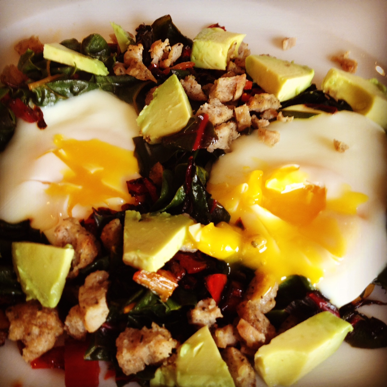 Platesd eggs and Swiss chard